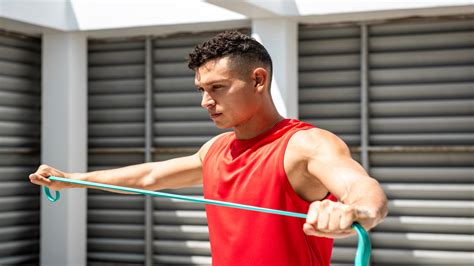 Try These 11 Best Shoulder Warm Up Exercises To Raise The Roof On