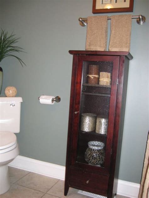 A large trendy modern rug is a great substitute for a few smaller ones and it offers an element of airiness to the bathroom. quirky bathroom in new house, Just moved to NC and the downstairs 3/4 bath is a little odd ...