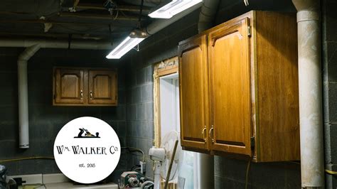 The best way to hang wall mounted cabinets would be to start with a level line on the wall where the bottom edge of the cabinets traditional wall anchors can pull out of plaster walls when attempting to hang curtains. Hanging Shop Cabinets on Cinder Block - YouTube
