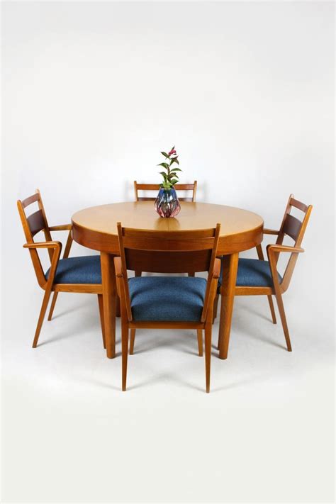 Shop our extendable dining tables online. Ash and Walnut Extendable Round Dining Table from Jitona ...
