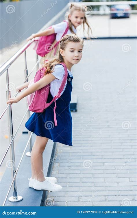 Little Schoolgirls With Pink Backpacks Playing Stock Image Image Of