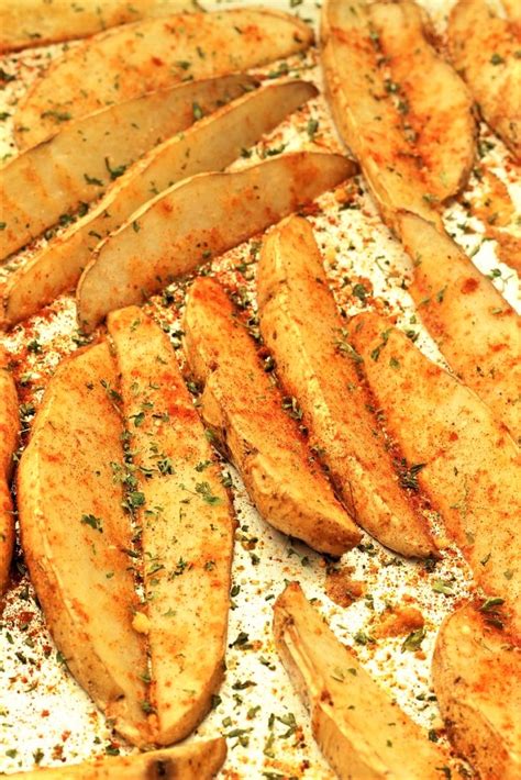 Add oil and spices and potatoes in ziploc baggies. Garlic Baked Potato Wedges - My Recipe Treasures