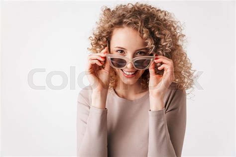 Smiling Blonde Curly Woman In Dress Take Off Sunglasses Stock Image Colourbox