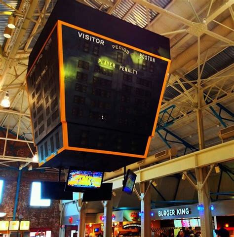 Shopping complex with skylights, upscale stores and elegant touches. The old Boston Garden scoreboard now hangs from the ...