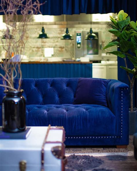 A Stunning Button Backed Electric Blue Velvet Sofa For The Living Room