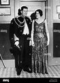 Gene Tunney and wife Polly Lauder Tunney in formal attire. He is Stock ...