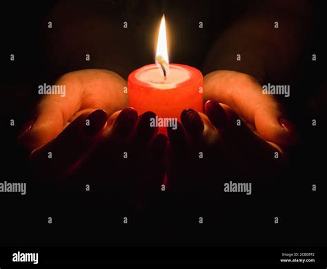 Holding Burning Candle In Hand Hi Res Stock Photography And Images Alamy