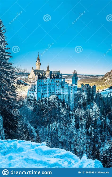 Vertical Shot Of Neuschwanstein Castle In Bavaria Germany Surrounded