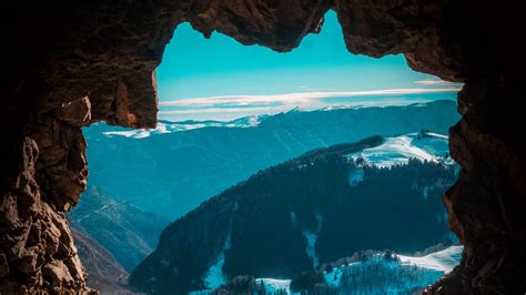 Download Wallpaper 2560x1440 Cave Mountains View Landscape