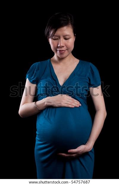 Attractive Pregnant Asian Woman Looking Down写真素材54757687 Shutterstock