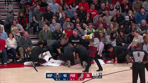 Massive Tray Of Drinks Gets Spilled When Ref Bumps Into Courtside