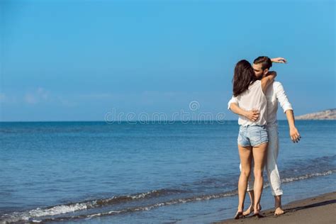 Romance On Vacation Couple In Love On The Beach Flirting Stock Photo Image Of Handsome