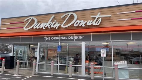 New Yorker Eats Boston Red Sox Donut At The Original Dunkin Donuts