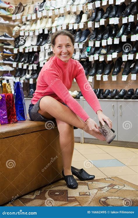 Woman Trying Shoes At Shoes Shop Stock Image Image Of Buying Counter