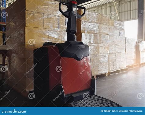 Cargo Shipment Boxes Warehousing Electric Forklift Pallet Jack With Stack Of Cargo Boxes On