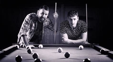A Man With A Beard Plays A Big Billiard Party In A 12 Foot Pool Stock Image Image Of