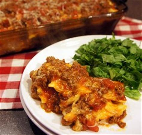 Arrange half of the frozen ravioli in a single layer over the sauce. Baked Ravioli Lasagna Recipe - RecipeTips.com