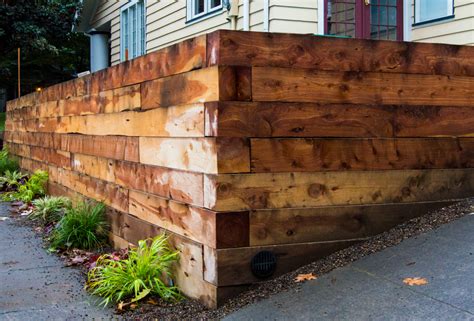 They can be built from a wide range of materials including bricks, timber, blocks, stone and besser blocks. Benefits of Wooden Retaining Walls - Interior Decorating Colors - Interior Decorating Colors