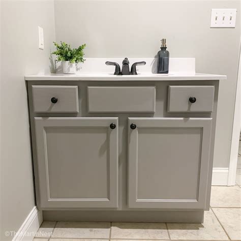 Well, get yourself some paint and a paintbrush that are proper for painting furniture and give your vanity a shot of a new glowing color. How to paint a bathroom vanity - themartinnest.com