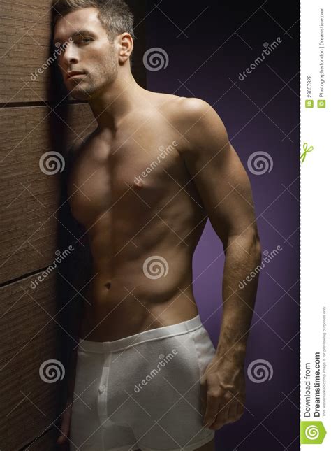 Shirtless Man Leaning By Wooden Wall Stock Photo Image Of Person