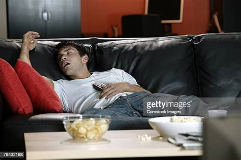 Passed Out On Couch Photos And Premium High Res Pictures Getty Images