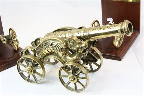 Pair Of Bookends In Brass And Wood Modelled As Field Cannons From The