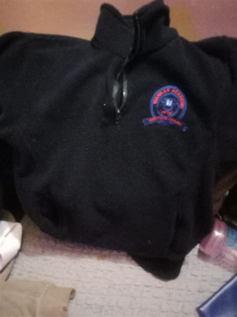 Branded Black School Fleece Jacket Tekiria General Suppliers Ltd