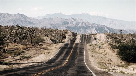 Grey Concrete Road Road Mountains Landscape Hd Wallpaper Wallpaper