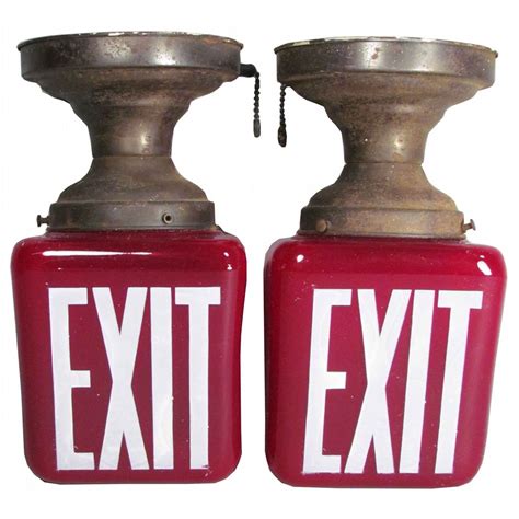 Two Ruby Glass Theatre Exit Signs