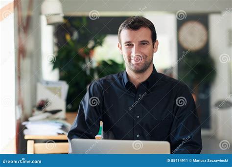 Successful Businessman Smiling And Working On A Laptop Stock Image Image Of Modern Adult
