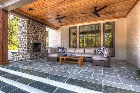 Front porches contribute immeasurably to issues of lifestyle, function and curb appeal. Back porch with Cedar tongue and groove ceiling and slate ...