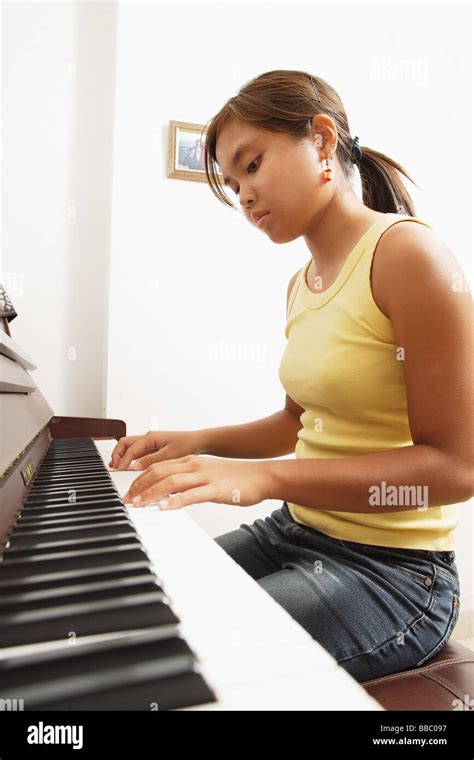 Chinese Woman Sitting Piano Hi Res Stock Photography And Images Alamy