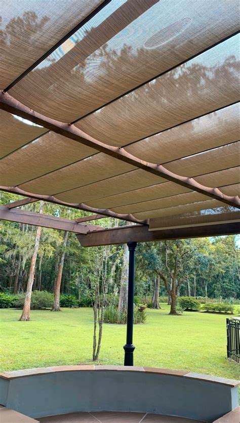 Tan Mesh Fabric Retractable Canopies Added To Outdoor Pergola Backyard