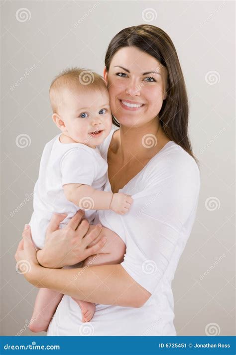 Mother Holding Little Baby Child Boy Making First Step Royalty Free