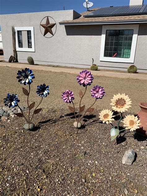 Family owned and operated since 1948. Flowers metal yard art for Sale in Phoenix, AZ - OfferUp
