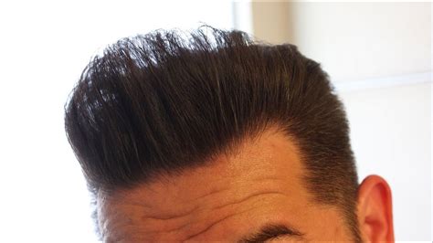 Work a strong hold product through damp hair and blow it dry with high heat. How to Comb a Pompadour - YouTube