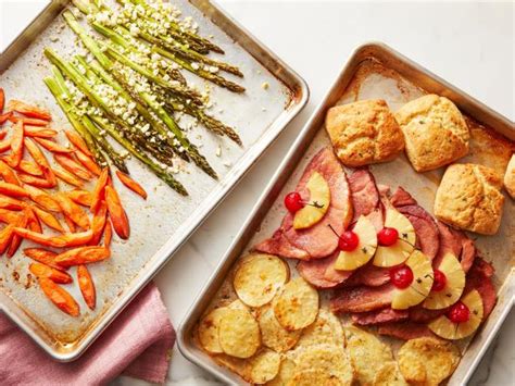Easter main dish recipes · ham slices being pulled apart with a fork honey baked ham · sliced roast beef on a platter with gravy being spooned . Easter Dinner on Two Sheet Pans Recipe | Food Network ...