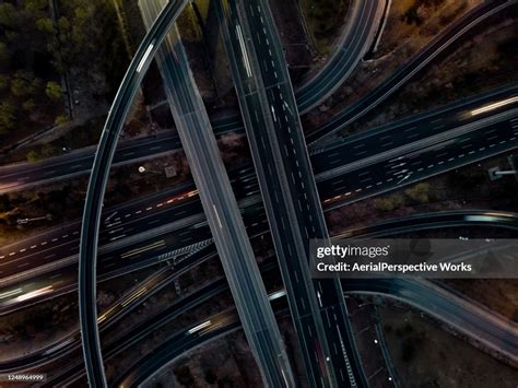 Aerial View Of Traffic And Road Intersection At Rush Hour High Res