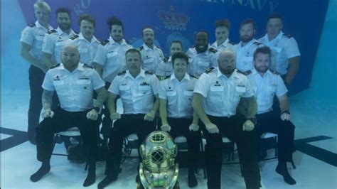 royal canadian navy divers take an epic underwater photo for graduation