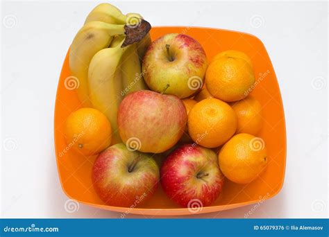 Composition Of Apple Banana And Mandarin Fruits In Bowl Stock Photo