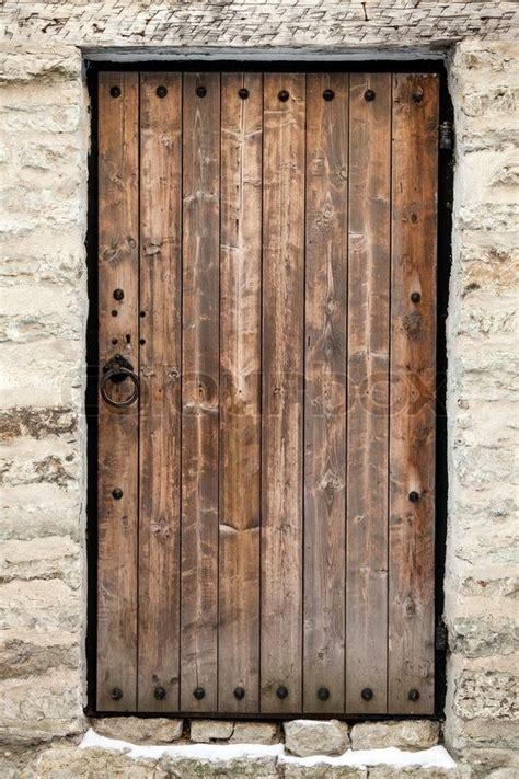 Maybe you would like to learn more about one of these? Ancient wooden door in old stone castle wall. Tallinn ...
