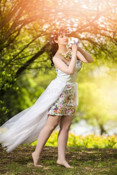 Fantastic Portrait Of Sensual Brunette Female In White Dress Outdoors