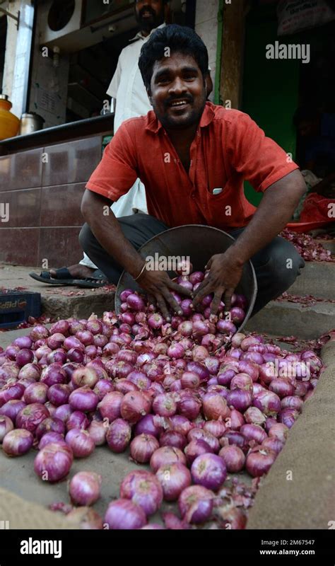 An Onion Vendor In The Market In Madurai India Stock Photo Alamy