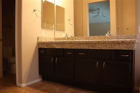 It is attached with adhesive and caulked around the perimeter. Raise the height of your bathroom counters | Home depot ...