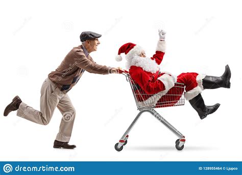 Senior Pushing A Shopping Cart With Santa Claus Stock Photo Image Of