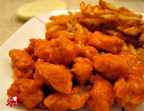 Letting them sit at room temperature evens the cooking time, and the cornstarch dredge transforms into a. Boneless Buffalo Wings