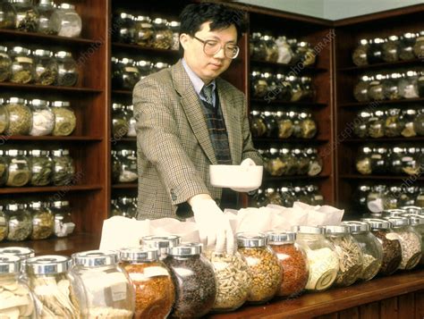 Herbalist In A Chinese Herbal Medicine Pharmacy Stock Image M750