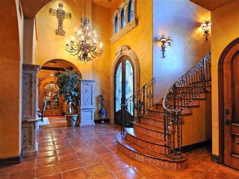 Gorgeous Spanish Hacienda Styled Home Featuring A Tiled Entry Foyer