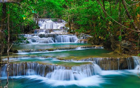 Tropical Cascade Waterfall In Kanchanaburi Thailand Nature Forest Green