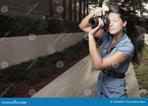 Photographer In Action Stock Image Image Of Blue Holding 10939855